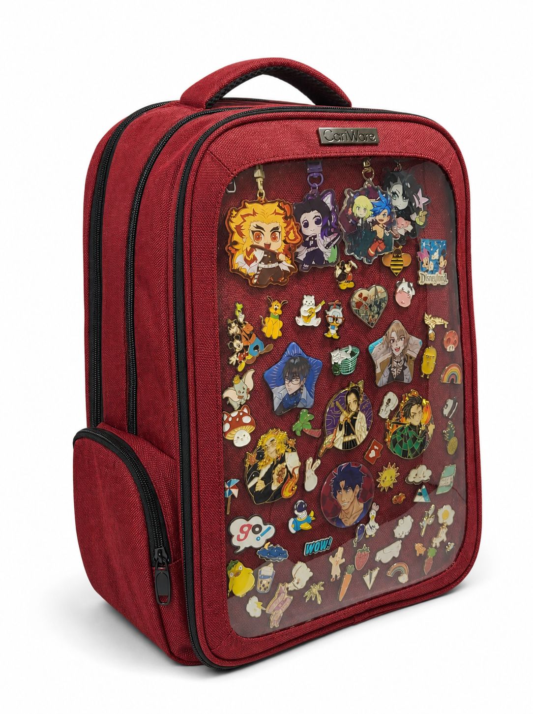A red fabric backpack with a clear front window displaying a collection of colorful anime and character pins, on a white background.